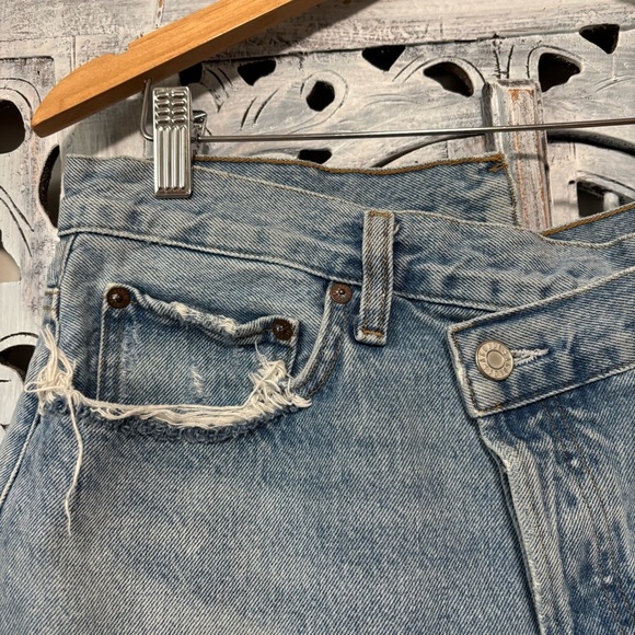 AGOLDE Criss Cross Symbol Medium Indigo Wash Asymmetrical Cutoff Jean Shorts - Picture 7 of 11